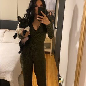 Gold and black jumpsuit. Super cute! Feels mesh but is not see through. So comfy